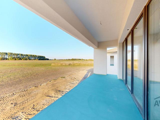 Novostavba | Priestranný 3 izbový byt so záhradou, parkovaním, úložným priestorom a krásnym výhľadom