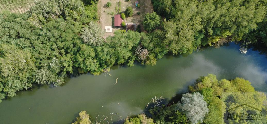 Záhrada (816 m²) pri Malom Dunaji v Malinove s chatkou, altánkom a studňou